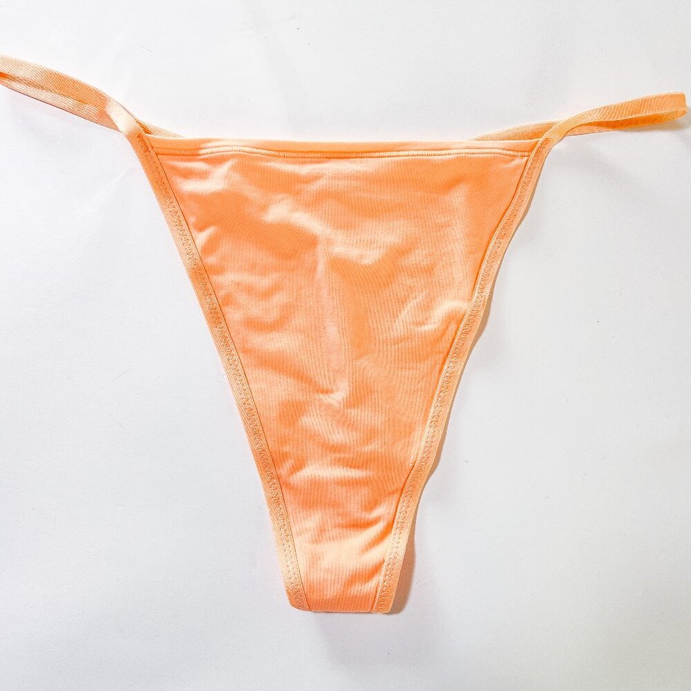 Skims FITS EVERYBODY T-STRING THONG  FADED NECTAR / XL
